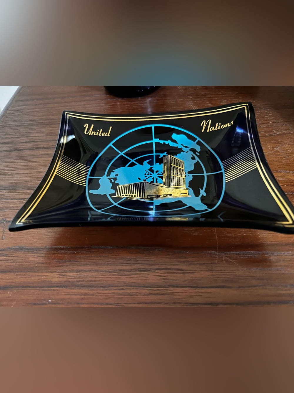 Vintage United Nations HQ NYC commemorative glass ashtray.
